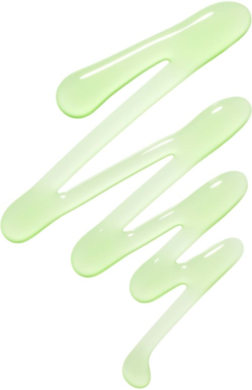 Light green liquid drops are spread in a zigzag pattern on a white background.
