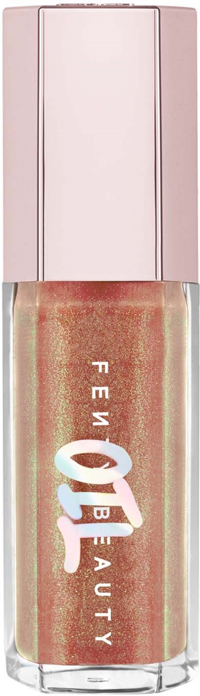 A bottle of peach-colored nail polish with white text and shiny cap.