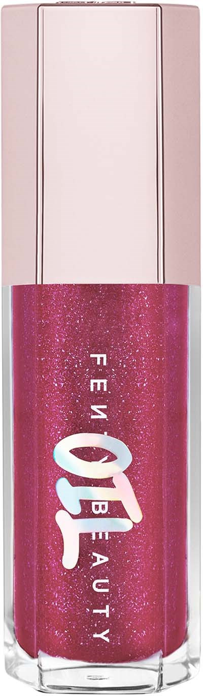 A pink, glittery nail polish with a clear cap and the words "FEMBEAUTY" on it.