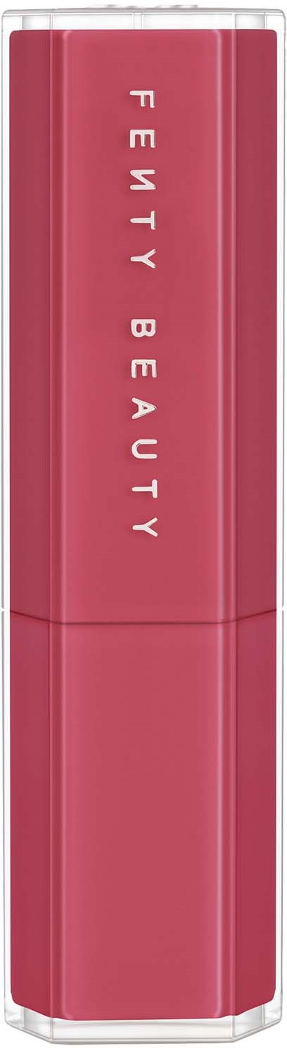 A pink lipstick tube with 'Fenty Beauty' written vertically on it.