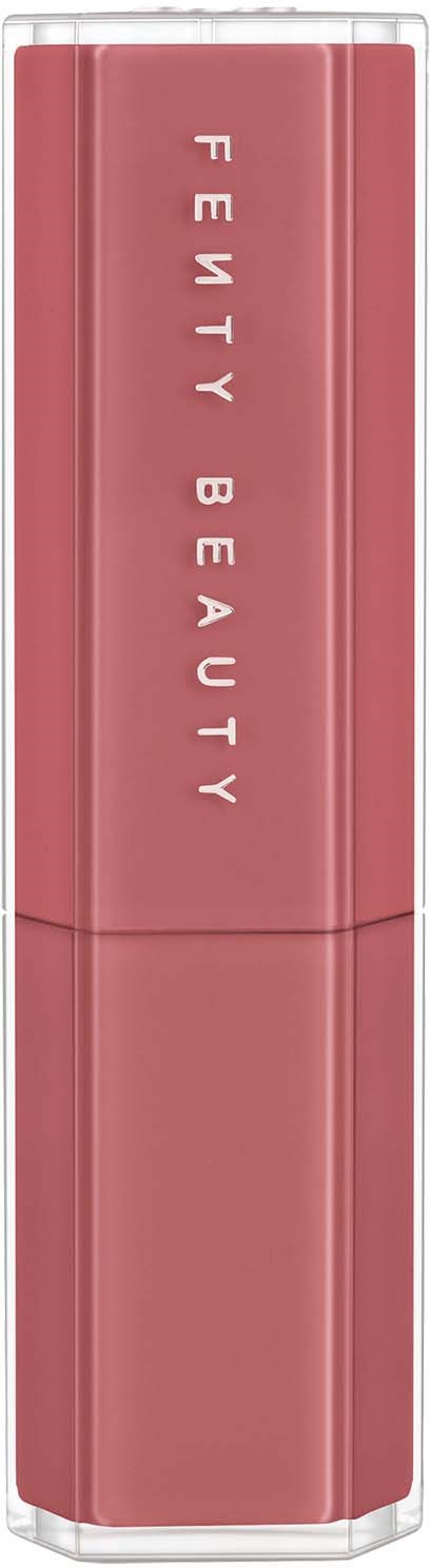 A lipstick tube in pink with 'Fenty Beauty' written vertically on it.