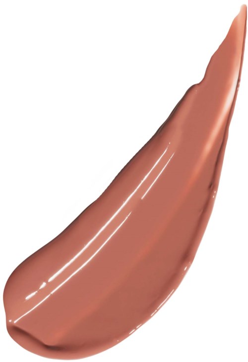 A spoon of brownish makeup or foundation with a smooth, shiny surface.