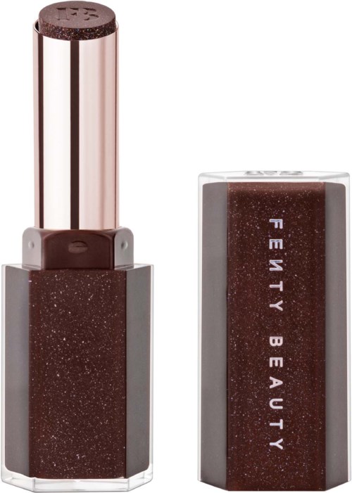 A lipstick tube with a shiny pinkish-brown cap and a dark, glittery brown body. The brand name 'Fenty Beauty' is on the side.
