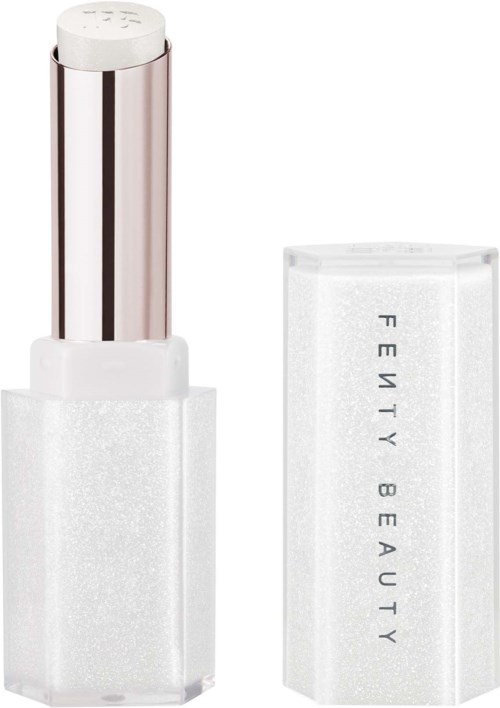 A white lipstick tube with a shiny silver cap and a separate white rectangular box with "FENTY BEAUTY" written.