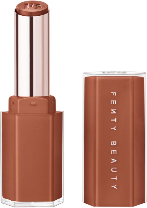 A lipstick tube with a brownish shade and clear cap, labeled 'Fenty Beauty' on the side.