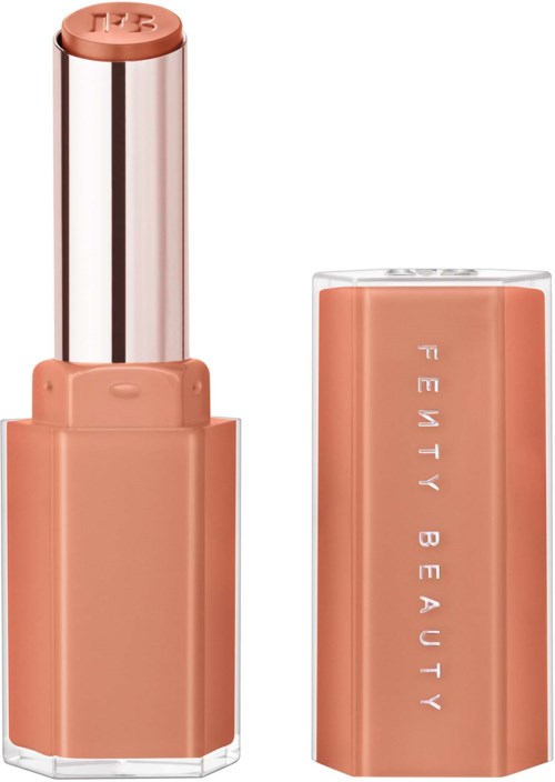 A lipstick with a peach-colored tube and a matching lid, the brand name 'Beauty Beauty' printed vertically.