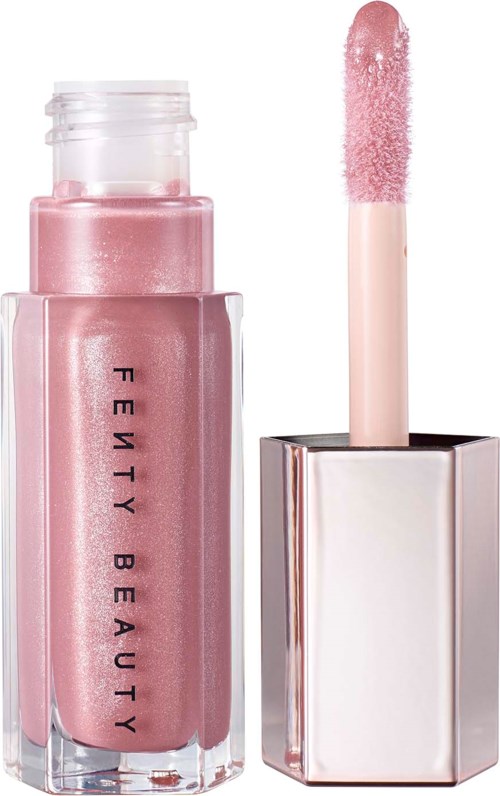 Pink liquid lipstick in a transparent bottle with a matching applicator and shiny cap.