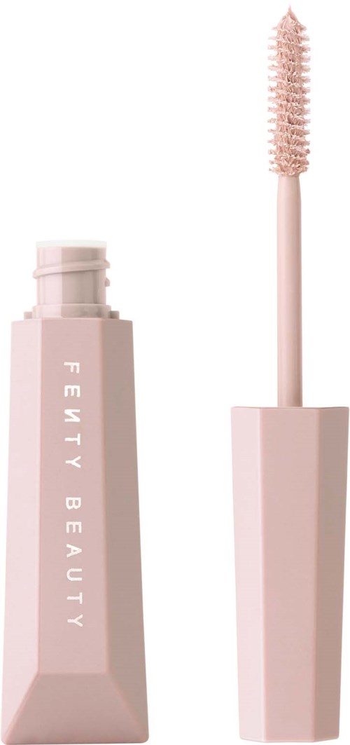 En rosa tub av Fenty Beauty ögonbrynskgegel med tillhörande borste, stående upprätt.