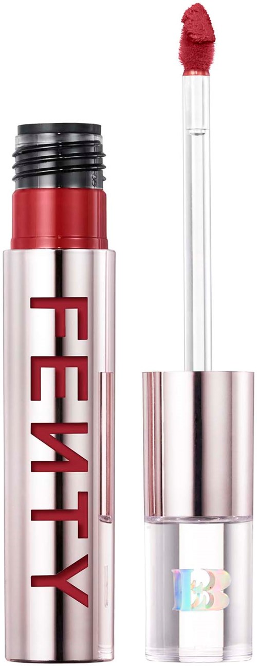 A lipstick tube with the word "FENTY" on it, with a red lipstick and applicator brush.