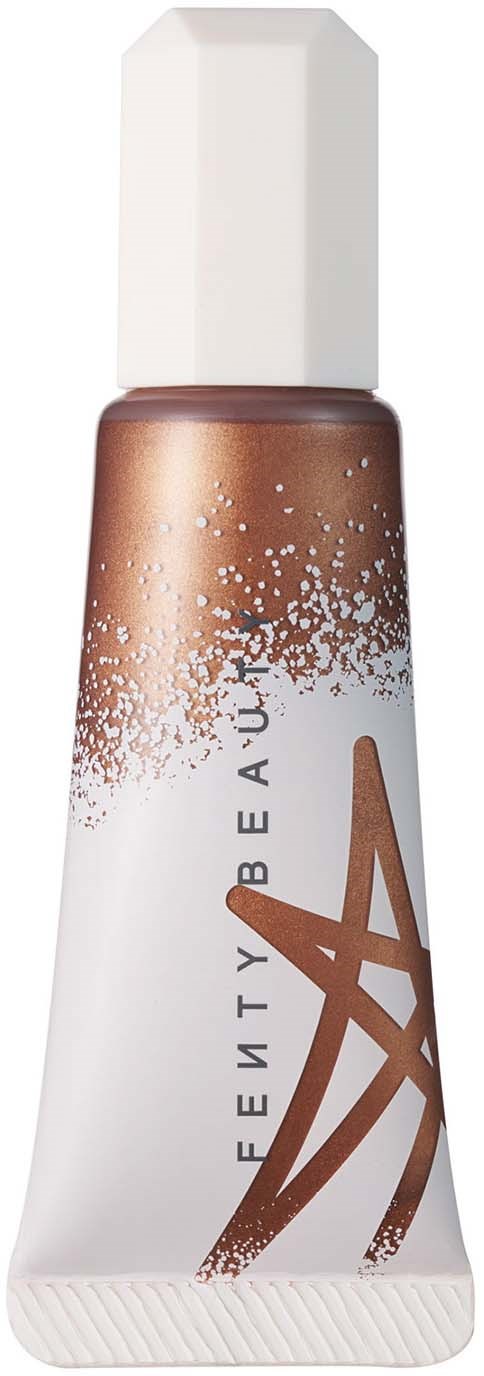A tube of foundation with a white cap, brown shade, and a design with splashes and lines.