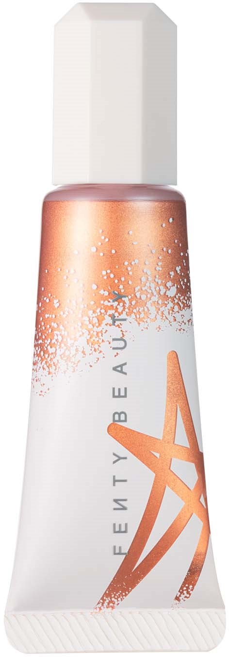 A white tube with a white cap, orange and silver design, and the words 'BEAUTY BUZZ' on it.