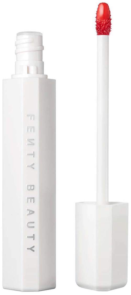 Lip gloss with a white cylindrical tube and a wand applicator with red tinted gloss.