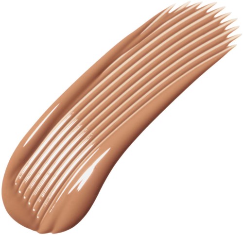 Prov av beige flytande foundation med jämn textur och flera ränder.