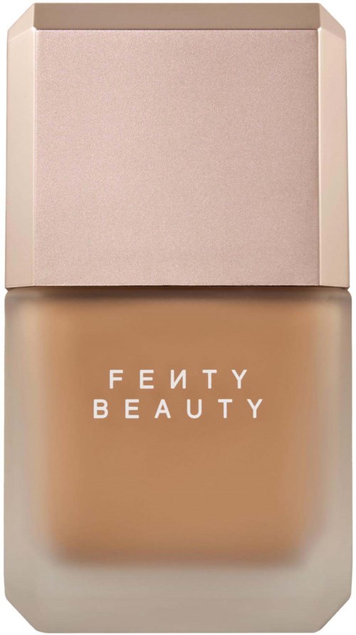 Fenty Beauty foundationflaska med beige lock och logo på fronten.