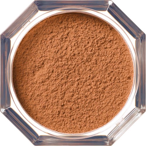 A small jar containing brown eyeshadow powder for makeup.
