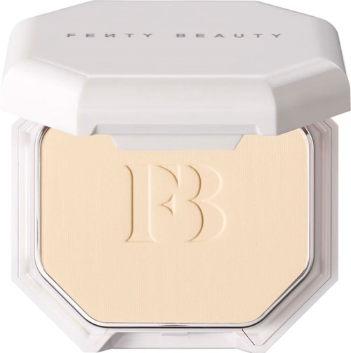 A compact with Fenty Beauty logo and pressed powder with embossed 13. Elegant and modern design.