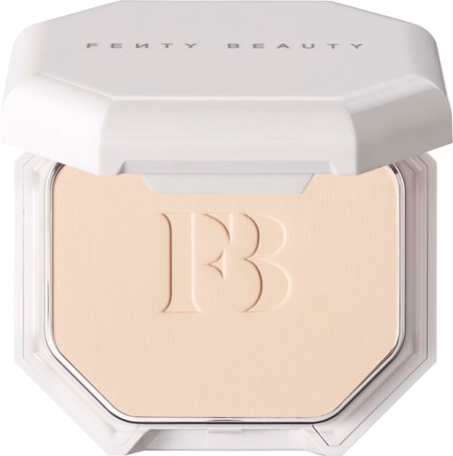 A compact with Fenty Beauty logo on the lid, showing a beige powder inside with a raised '13' design.