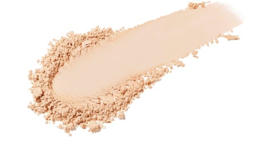 A beige powder spread in a curved shape, with some scattered around it on a white background.