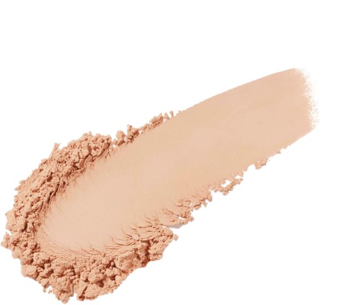A beige powder spread with a curved streak, likely makeup or powder foundation.