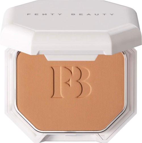 A compact with Fenty Beauty logo, containing pressed powder or foundation, embossed with a '13' design on surface.