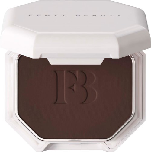 A brown eyeshadow in a white compact with high-end branding, embossed with the number 13.