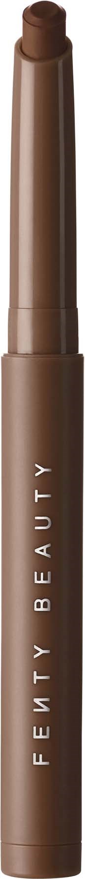 A brown pencil-shaped makeup product with the words 'FETY BEAUTY' written vertically on the body.