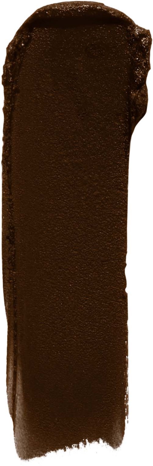 A large chocolate cake with smooth, rich frosting. It has an uneven edge on one side and a shiny surface.