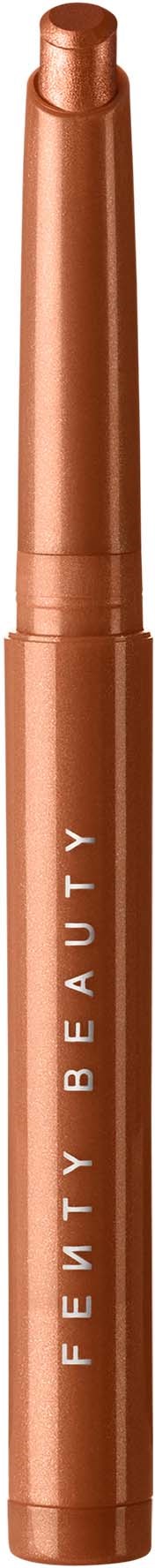 A rose gold lipstick with a shiny cap and the words 'FELTY BEAUTY' written on its body.
