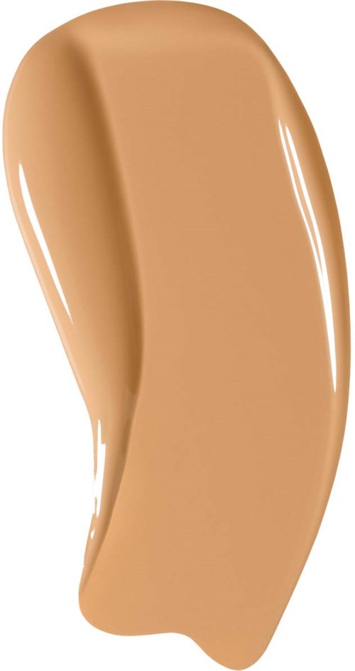 En virvel av beige flytande foundation med glasyraktig yta.