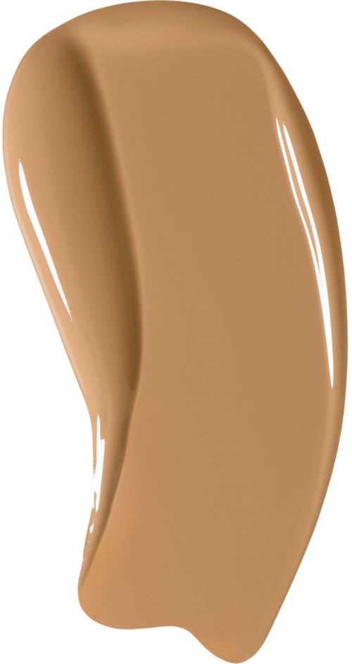 En beige smet av flytande makeup med kurvad form och slät yta.