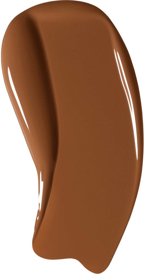 En slät, böjd klick av chokladsås med glänsande yta.