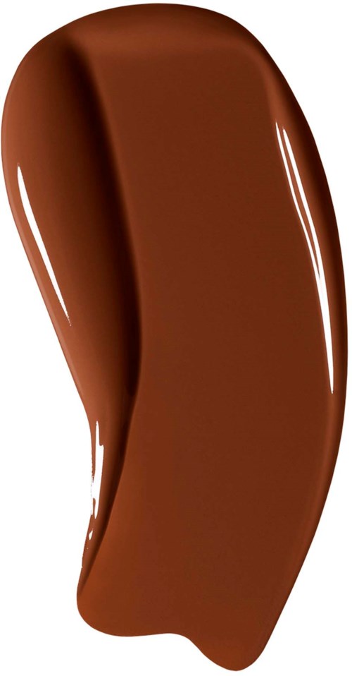 En slät, glänsande, brun sak med kurviga kanter, som liknar en bit choklad eller en chokladkaka.