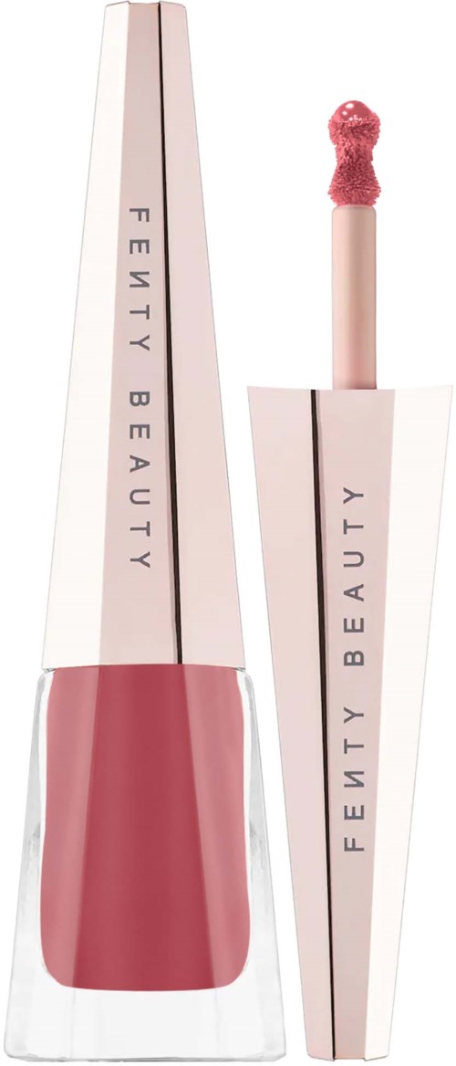 A pink lip gloss with a white and gold packaging, labelled 'Fenty Beauty', with the applicator shown.
