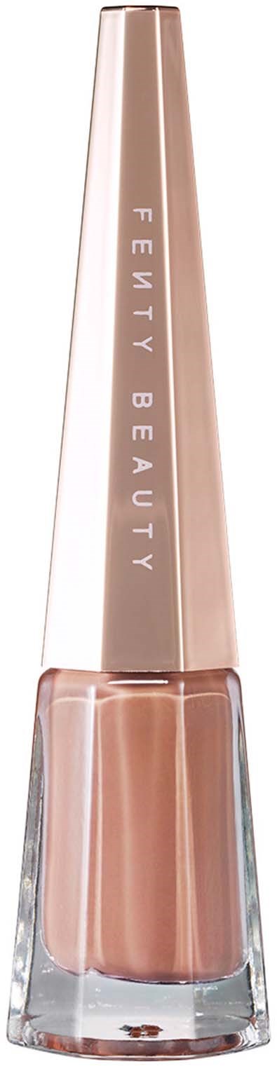 A nail polish bottle with a gold cap and a clear base showing beige nail polish inside.