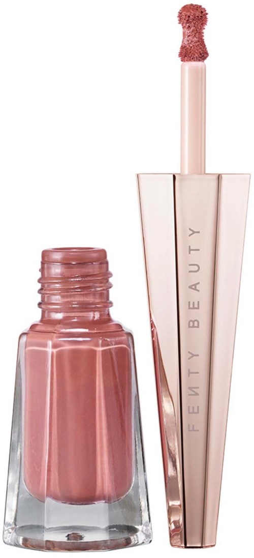 Lip gloss with a pink color, applicator wand, and a shiny metallic pink tube. The brand name is on the tube.