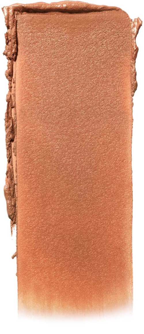 En rektangulär persikofärgad makeup- eller rougeprodukt med oren kanter.