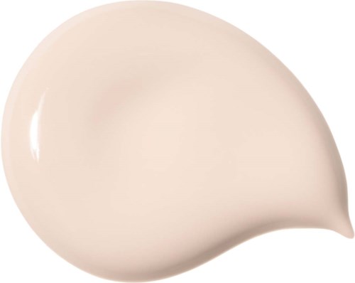 Ett beige, ovalt form med en liten spetsig ände till höger, slät yta, inga andra märken.