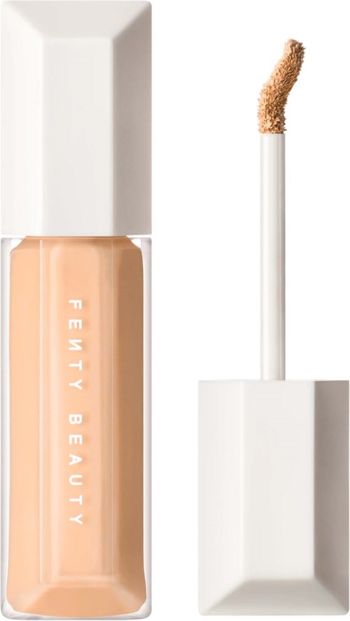 En flaska av Fenty Beauty concealer med vit lock och applikator som visar produkten på.