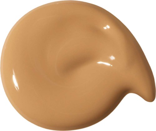En beige snurrformad som ser ut som mjukig glass eller en virvel, med glänsande yta och böjd spets.