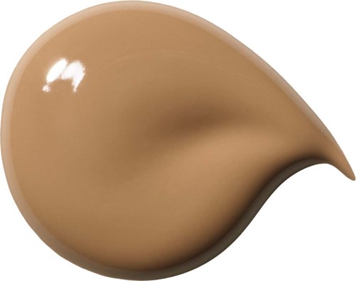 En klick beige flytande foundation med svart kant, formad som ett tårdryck.