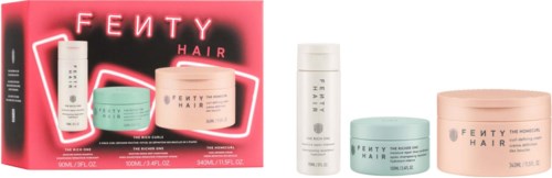 Fenty Hair products in pastel pink and mint, with a neon sign background and various containers.
