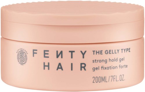Pink jar of Fenty Hair gel with text about its strong hold and size, 200ml.