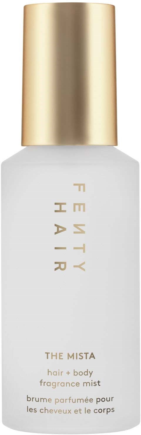 A white bottle with gold cap, labeled 'Fenty Hair' and 'The Mista,' a fragrance mist for hair and body.