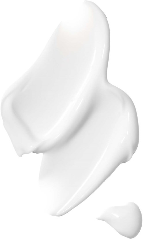 White cream or lotion shaped like a swirl with a small drop below.