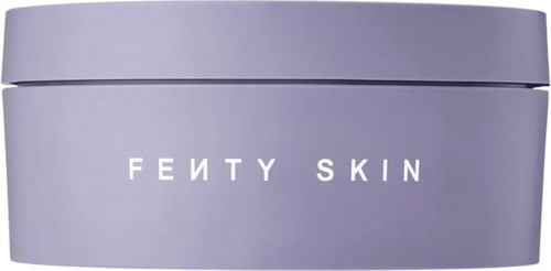 A round, light purple container with the words "FEITY SKIN" on it, probably a skincare product.