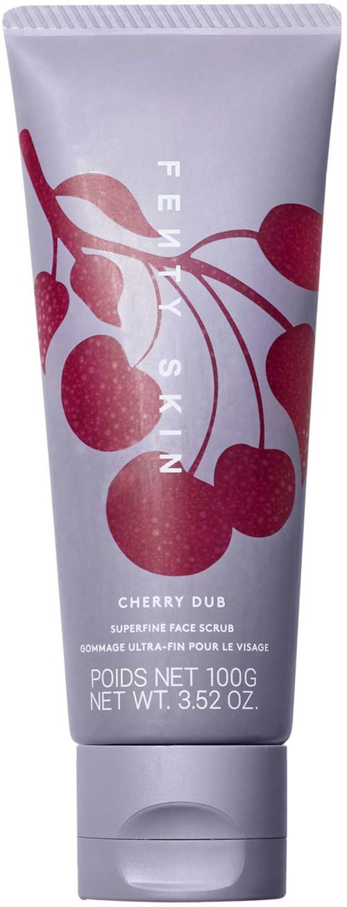 A white tube of Cherry Dub face scrub with red cherry illustrations and text describing the product.