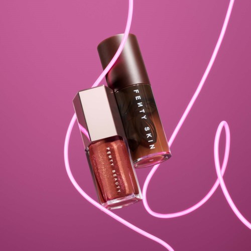 Two bottles of lipstick or nail polish with a pink background and glowing pink lines.