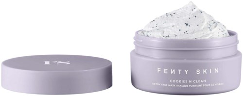 Fenty Skin Cookies N Clean detox face mask in a purple jar with the lid off, showing white textured mask inside.