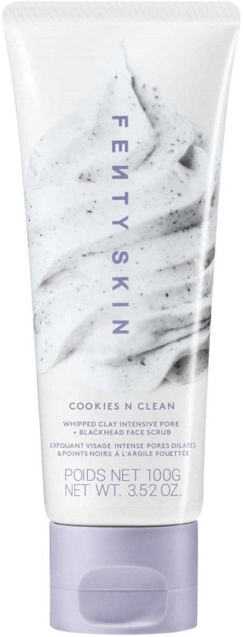 Fenty Skin face scrub in a white tube with purple cap, containing black and white exfoliating particles.