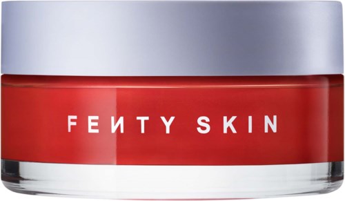 A jar of Fenty Skin skincare product with red and silver packaging.